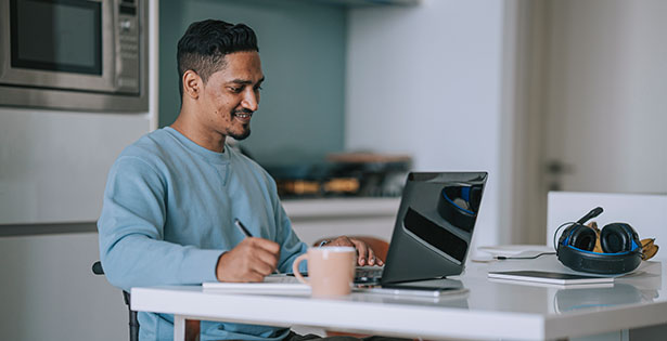 Student studying online at home.