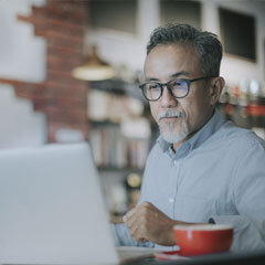 male looking at computer