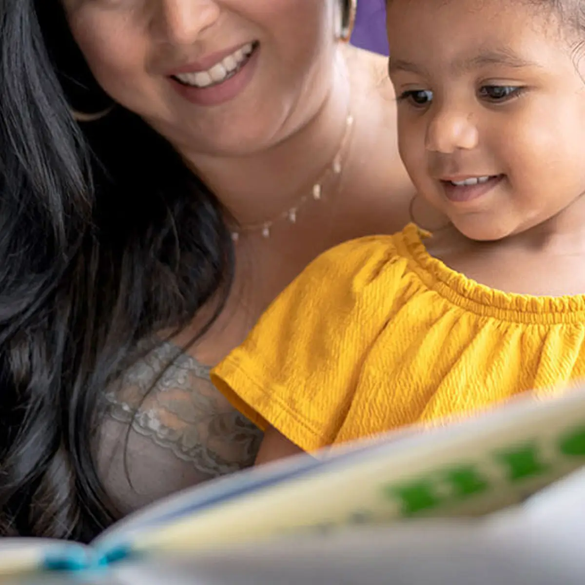 mom and daughter reading